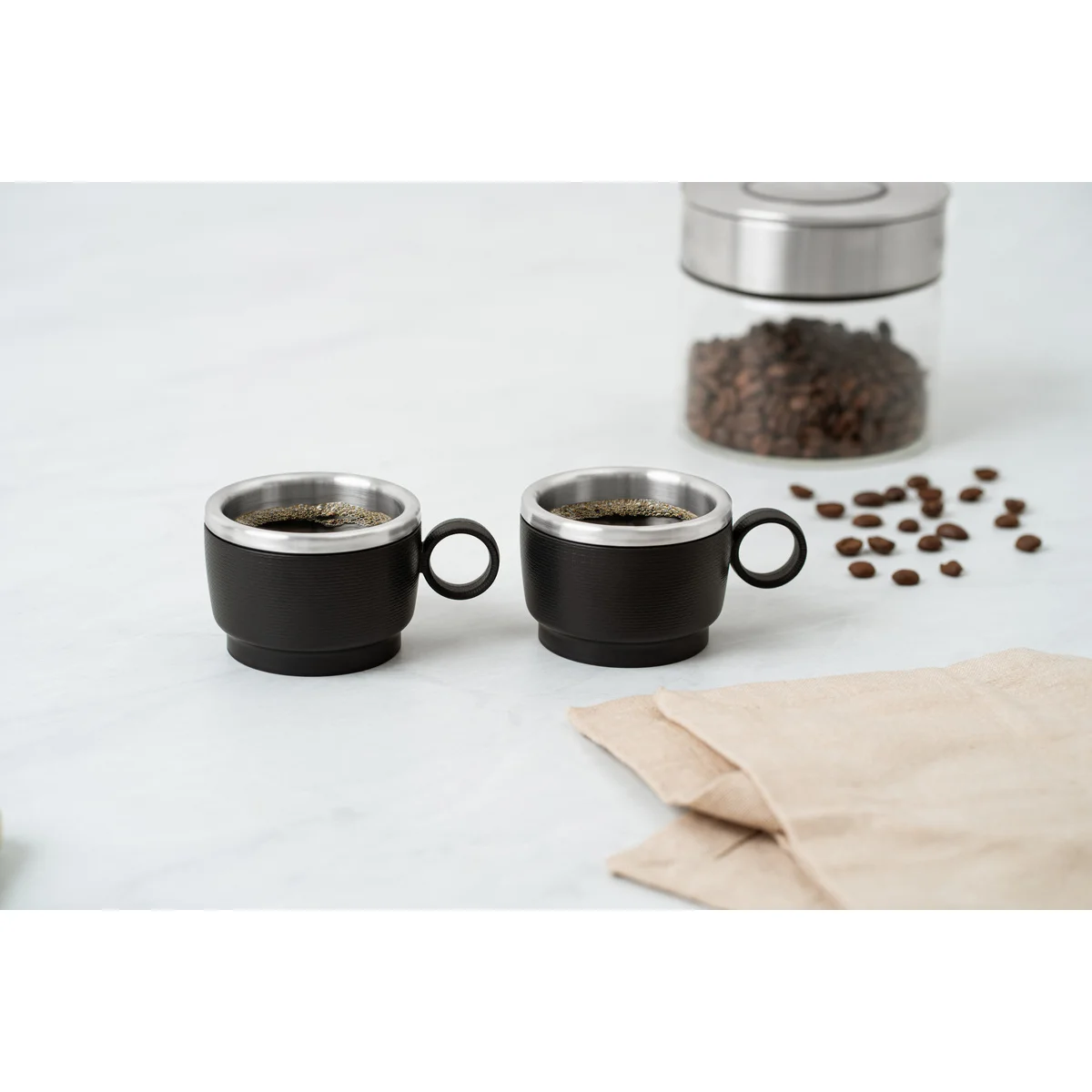 Conjunto de Xícaras para Café Tramontina Empilháveis em Aço Inox com Revestimento em ABS Preto e Alça Redonda 2 Peças 80 ml