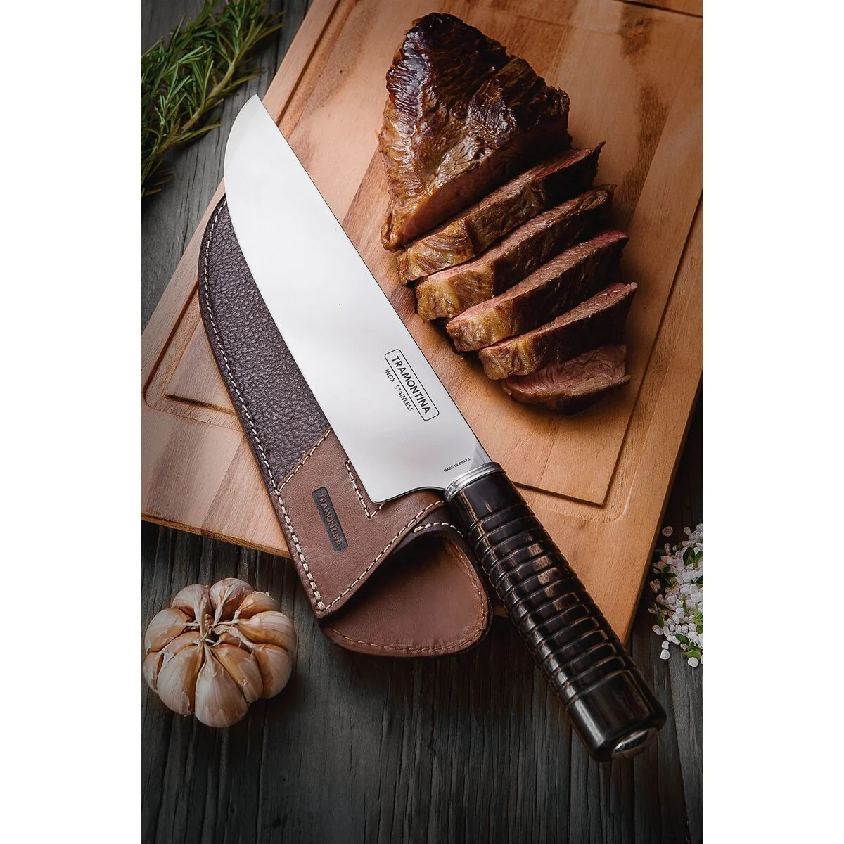 Faca para Carne Tramontina com Lâmina em Aço Inox e Cabo de Madeira Tratada Polywood Castanho com Bainha de Couro 8"