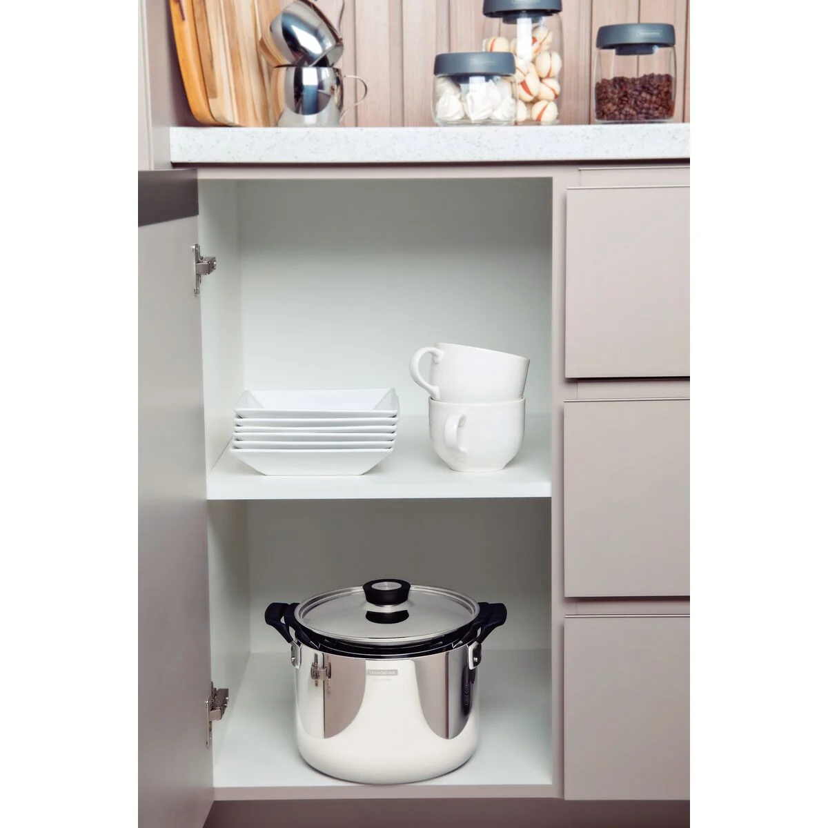 Jogo de Panelas Tramontina Grano Compact em Aço Inox com Corpo Triplo e Alças com Revestimento em Silicone Preto 3 Peças