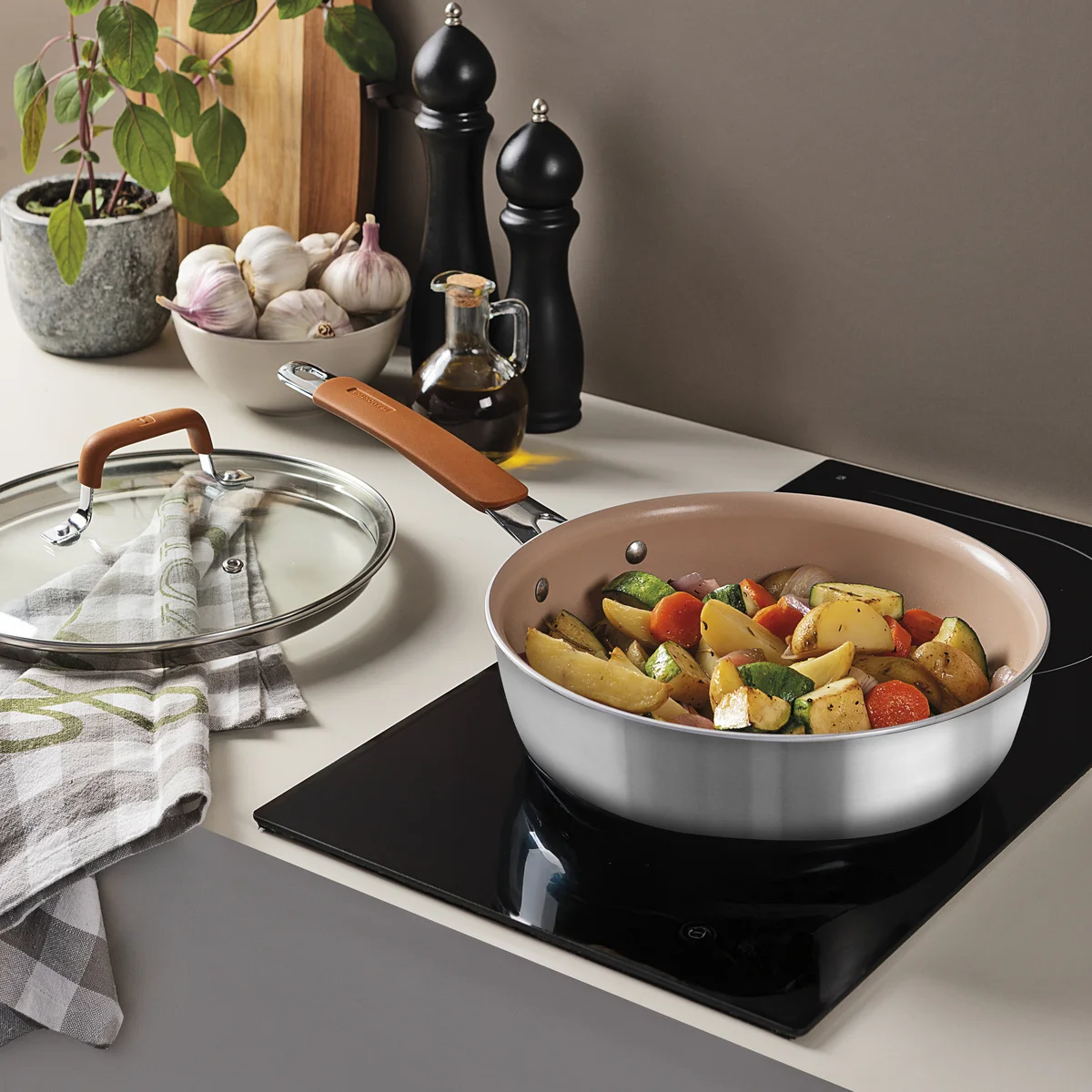 Jogo de Panelas Tramontina Romagna em Aço Inox e Alumínio com Revestimento Interno Cerâmico Marfim 4 peças