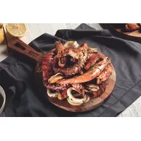 Tábua Tramontina Rost Redonda para Servir em Madeira Jatobá Mesclada com Cabo e Acabamento Óleo 34x23 cm